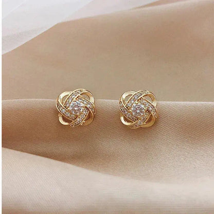 Luné® | Celeste — Gouden Spiraaloorbellen met Kristallen